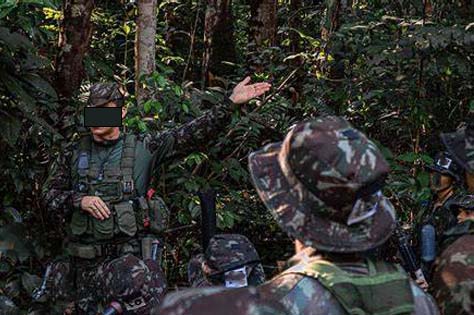 Special Forces personnel training in a field environment