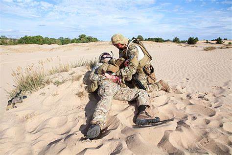 Combat medic team conducting tactical casualty care training