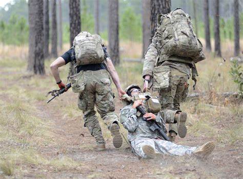 Team carrying a casualty during a rescue exercise